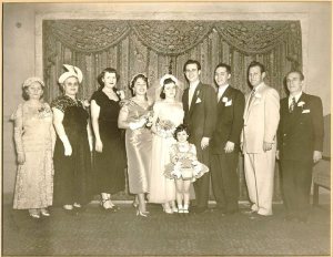 Betty, Irving's mother, Irving's sister-in law, Frieda, Estelle, Irving, Irving's brother, Abe Albert, and Isidor Feuerstein at Estelle and Irving's wedding