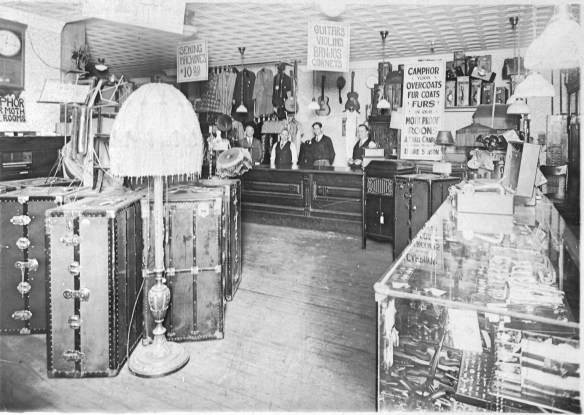 Bernard Sluizer's pawnshop Bernard, far left; his son, Mervyn, Sr., far right