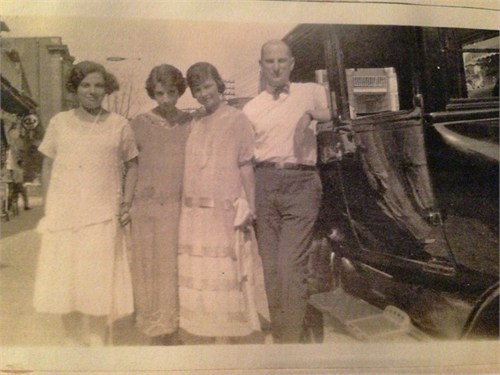 Flora Cohen and Jacob Weil with their daughter Maizie and unknown other