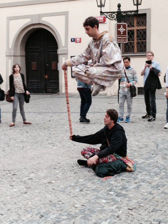 Street performers---can anyone tell me how they do this??